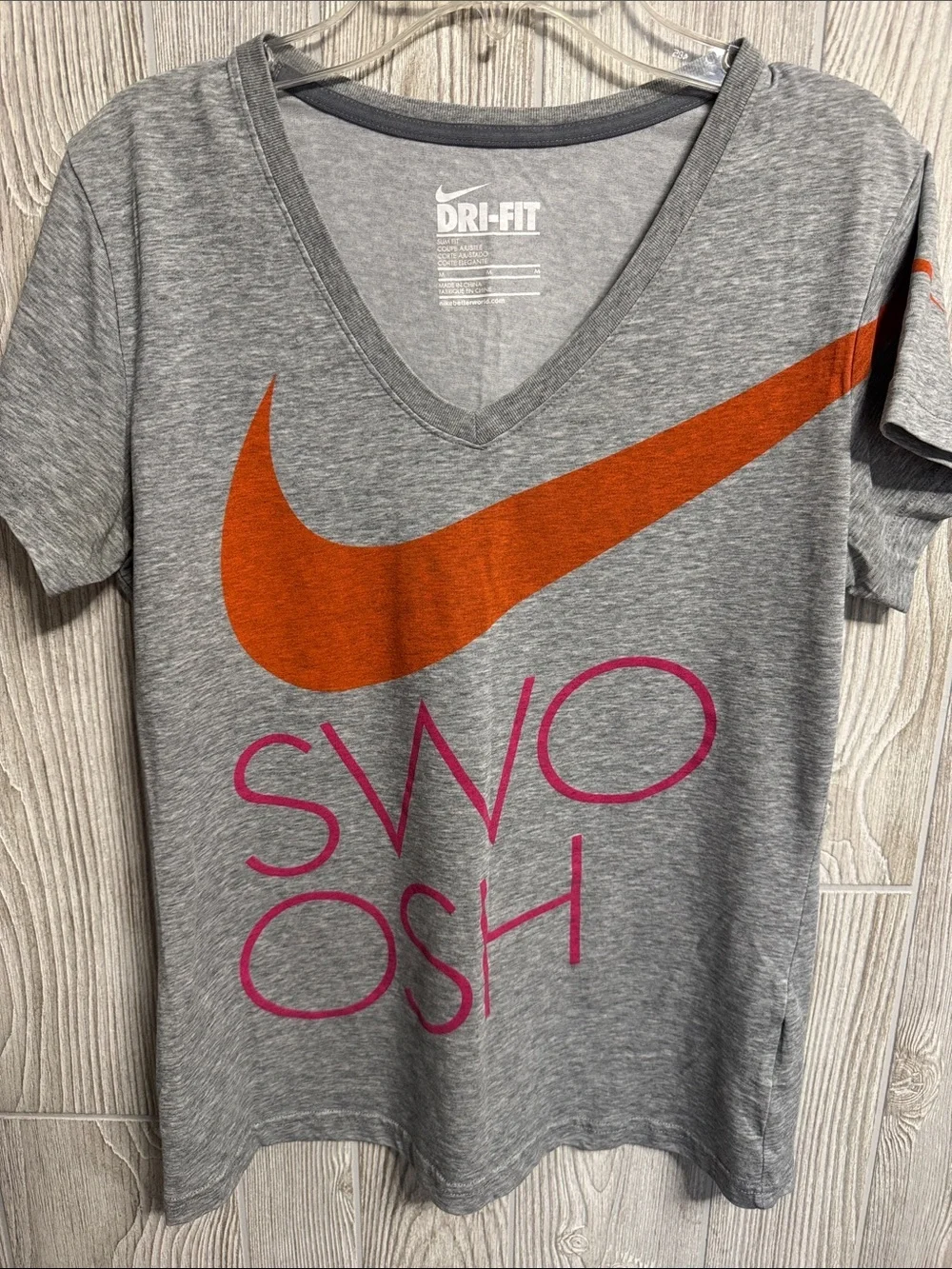 Nike Gray Dri-FIT Short Sleeve Tee with Orange Swoosh and Pink Logo